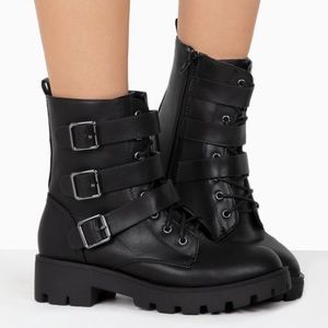 Black buckle combat boots